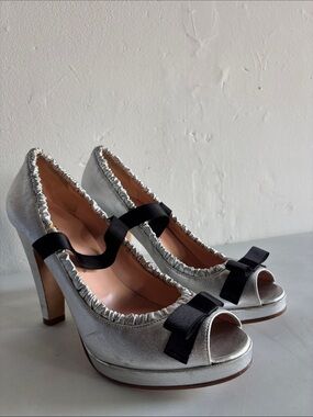 Marc Jacobs Silver Peep-Toe Heels with Black Bow Accent